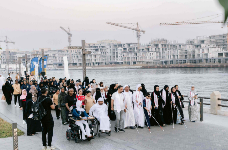 Dubai Culture and Dubai Club for People of Determination host awareness walk to support the visually impaired
