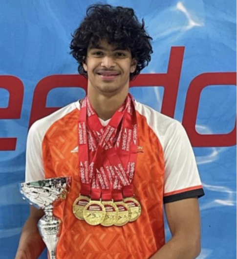UAE Swimmer Hussein Shawky Makes History with Gold and Silver at Asian Age Group Championships