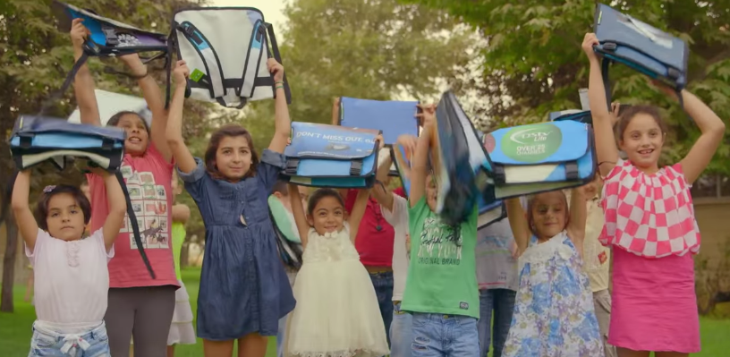 Emirates NBD upcycles advertising billboards  into school bags for deserving children