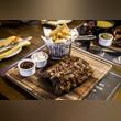 Enjoy the Theme Nights at Nezesaussi Grill in Manzil Downtown