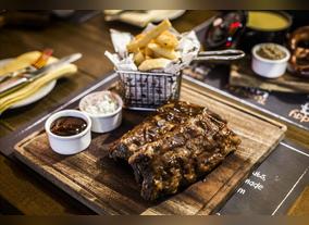 Enjoy the Theme Nights at Nezesaussi Grill in Manzil Downtown