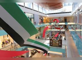 The Dubai Mall Celebrates UAE Flag Day with Floating Colours,  a 180-metre-long art Installation Spanning Three Levels