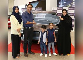 Indian National wins a Tesla with Emirates Islamics Kunooz Savings Account