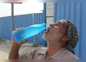 Al Ansari Exchanges Beat the Heat Initiative Provides Cool and Refreshing Water Containers for UAE Laborers and Workers