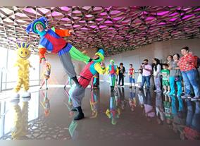 All Smiles At The Top: Modhesh Spreads Cheer  Among Burj Khalifa Visitors