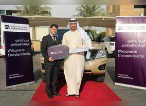 Emirati winner drives away with a Nissan Patrol in the Emirates Islamic Union Coop Tamayaz Card Promotion