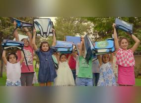 Emirates NBD upcycles advertising billboards  into school bags for deserving children