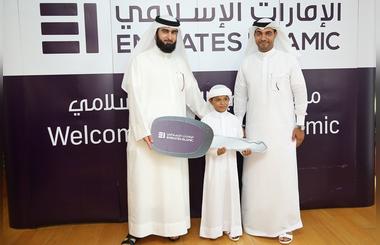 Eight year old Emarati wins Bentley car in the monthly Emirates Islamic Kunooz Draw