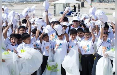 Record number of schools and volunteers clean up Al Mamzar Beach during Waste Free Environment campaign