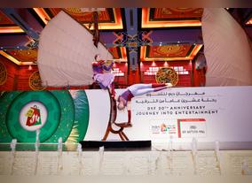 Acro Violin performers flex their muscles to music  