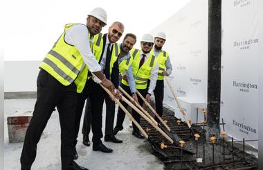  Ellington Properties recognizes topping out of Harrington House in JVC as per schedule 