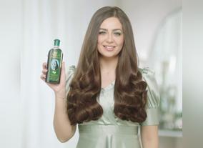 The new brand ambassador for Dabur Amla Hair Oil, Heba Magdi assigned by Dabur International