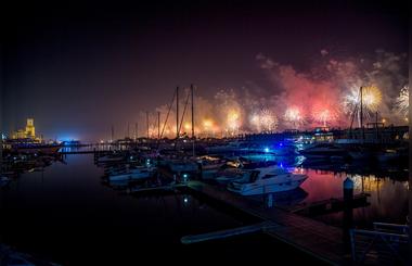 Watch the impressive fireworks at Al Hamra Marina & Yacht Club