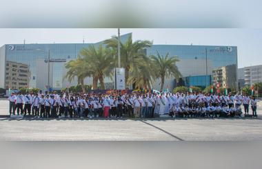 Dubai Investments Employees paint Ghaf leaf wall mural marking the Year of Tolerance